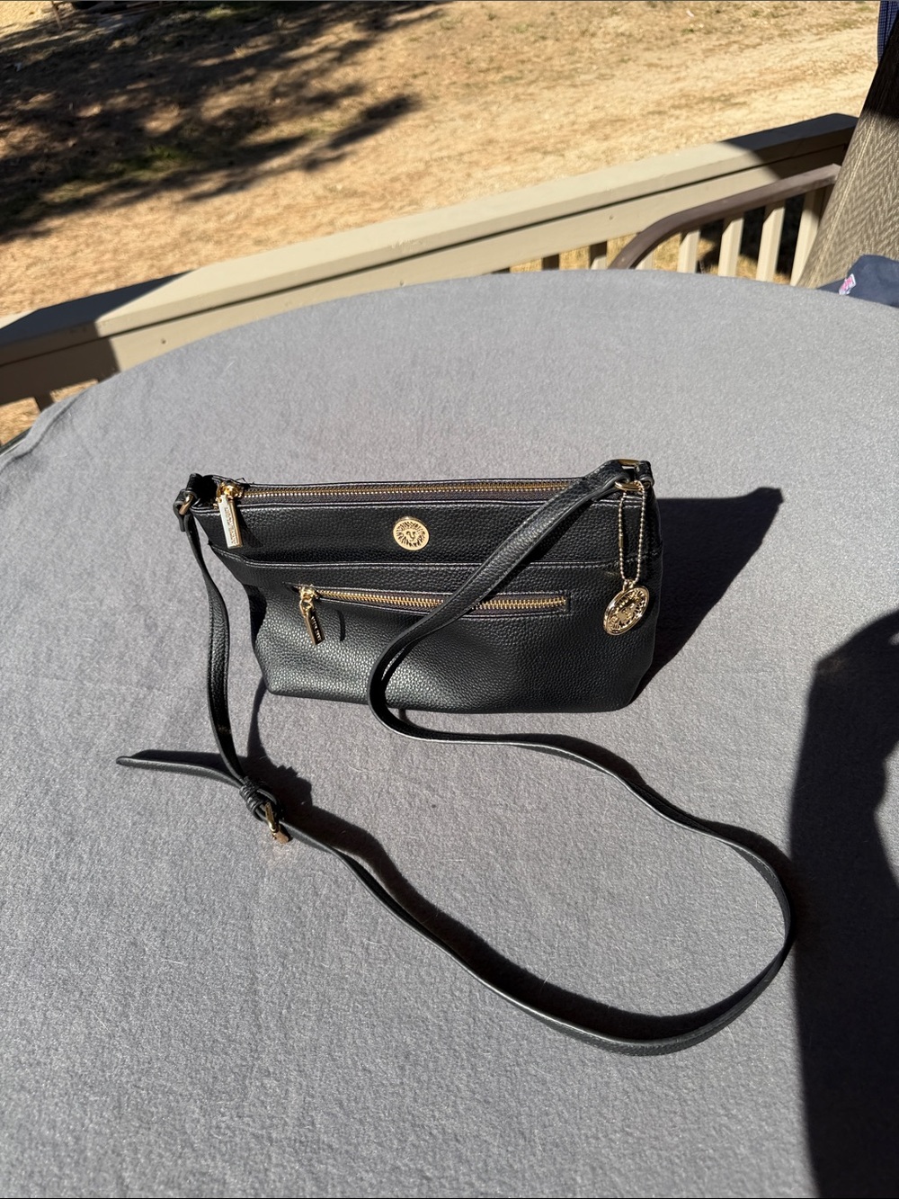 Anne Klein Black Pebbled Leather Crossbody with Gold Lion Medallion